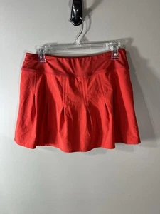 Falda corta naranja mediana Athleta para mujer rendimiento tenis entrenamiento dorado - Imagen 1 de 9