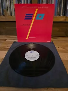 12" Single Electric Light Orchestra. Calling America/ Caught in a Trap. 1986 - Picture 1 of 2