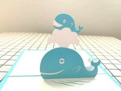 Tarjeta emergente 3D para nuevas ballenas de camada bebé Foto 1 de 3