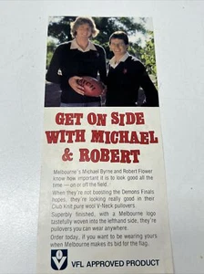 VINTAGE VFL AFL MELBOURNE DEMONS MICHAEL BYRNE ROBERT FLOWER ADVERTISE FOOTBALL - Picture 1 of 7