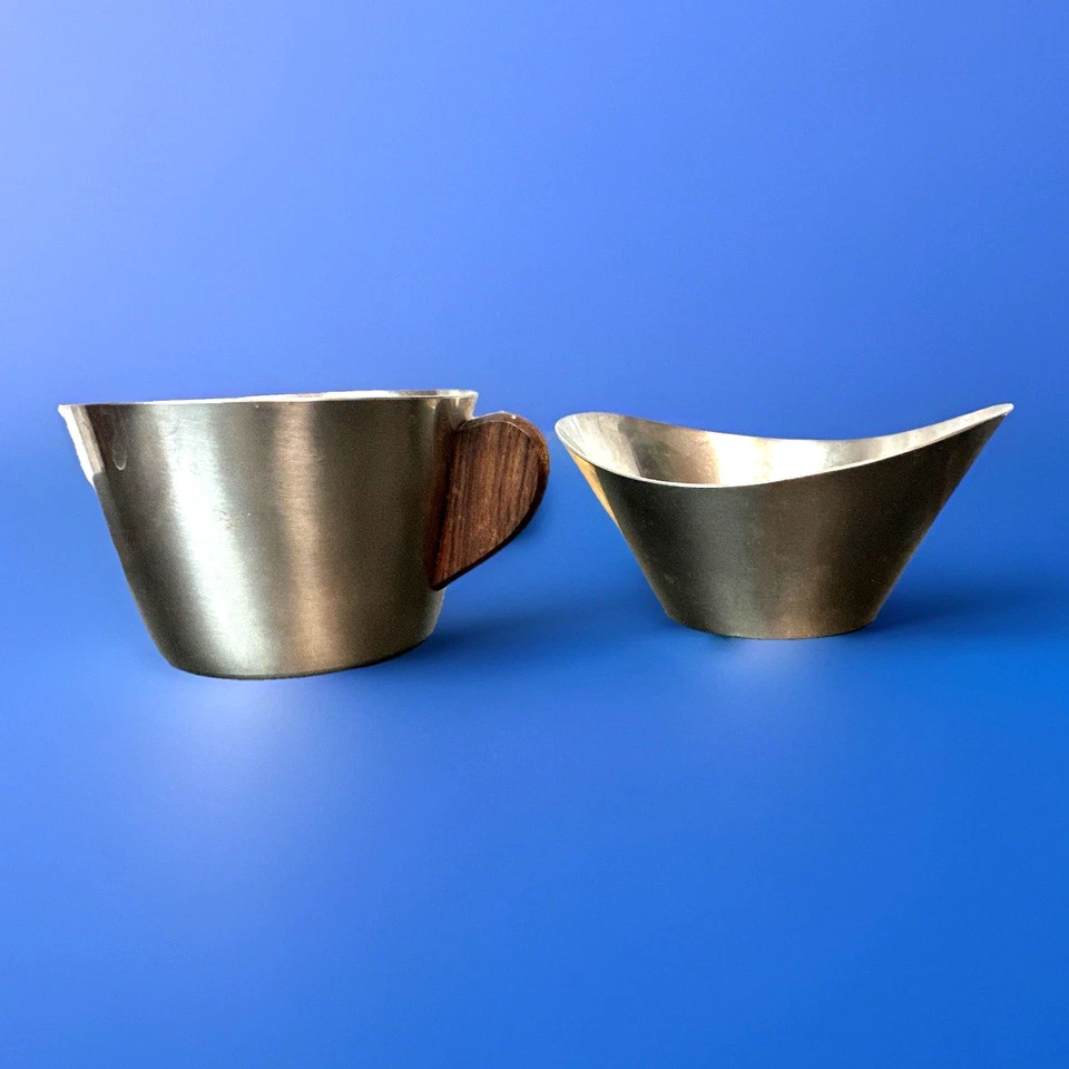 Crema/azúcarero Dinamarca de acero inoxidable de colección mango de teca atributo Jens Quistgaard Foto 1 de 4