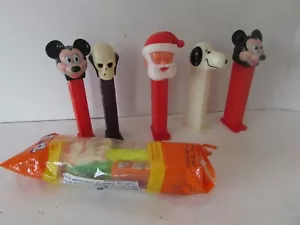 6 PEZ DISPENSERS MICKEY MOUSE SNOOPY SANTA SKULL  AND SLIMER   L144 - Picture 1 of 1