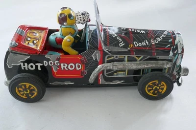 Coche de fricción litográfica de hojalata vintage Hot Rod Dog Japón Foto 1 de 4