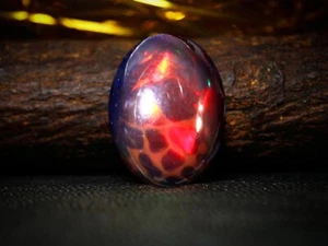 HoneyComb Welo Black Opal Oval Red Fire Ethiopian Black Opal Cabochon 13x10x5mm. - Picture 1 of 6