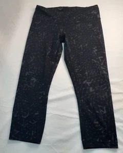Pantalones capri deportivos de tiro medio negros y grises Lululemon para mujer talla 8 - Imagen 1 de 9