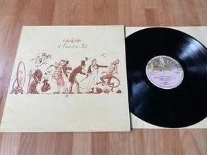 Genesis a trick of the tail Lp Ex - Picture 1 of 10