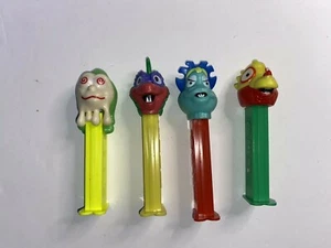 Four Vintage Monster Pez Candy Dispensers with Feet - Picture 1 of 9