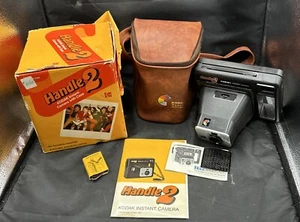 Cámara fotográfica instantánea Kodak Handle2 vintage con estuche y correa de transporte años 70’s 80’s - Imagen 1 de 7