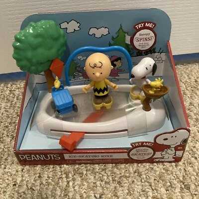 Jogo de pista de patinação no gelo Peanuts Snoopy, Charlie Brown e Woodstock novo na caixa - Imagem 1 de 4