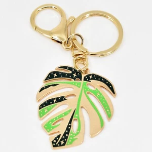 Metal Monstera Deliciosa Queso Suizo Planta Hoja Esmalte Llavero Anillo Clip - Imagen 1 de 4