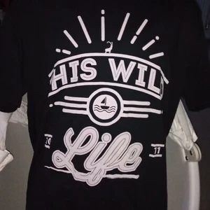 This Wild Life 2011 T-shirt Size XL. New.Ex Display - Picture 1 of 3