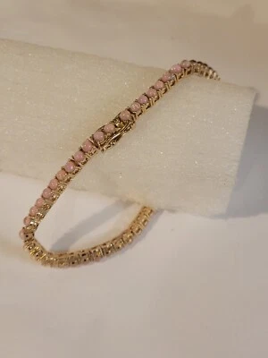 Pulsera estilo tenis creado en laboratorio ópalo rosa tono dorado Foto 1 de 4