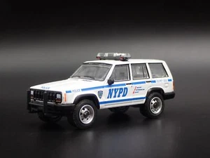 JEEP CHEROKEE XJ SPORT 4 DOOR NEW YORK NYPD POLICE 1:64 SCALE DIECAST MODEL CAR - Picture 1 of 7