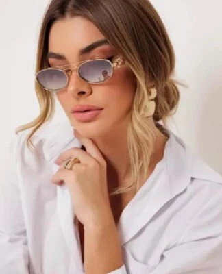 Gafas de sol MIU MIU MU 54ZS 5AK30C doradas grises degradadas ovaladas para mujer AUTÉNTICAS Foto 1 de 4