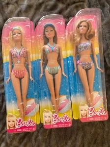 3 Barbie Strandpuppen - 2012 Barbie, Teresa & Summer - Seepferdchen Muschel Seestern - Bild 1 von 8