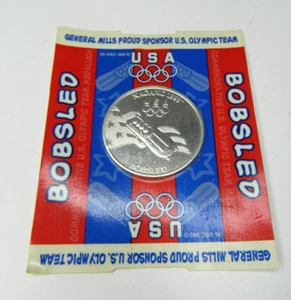 General Mills 1998 Nagano Olympics Aluminum Collector Coin BOBSLED Sealed coin - Picture 1 of 4
