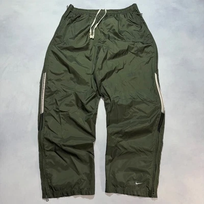 Pantalones deportivos Nike cortavientos vintage años 90 para hombre XL verde oliva holgados pierna ancha Y2K Foto 1 de 4