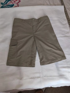 UNDER ARMOUR BOYS CARGO BREATHABLE WOVEN SHORTS KHAKI GOLF SCHOOL YOUTH SZ Large - Picture 1 of 5