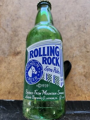 Botella de cerveza Rolling Rock extra pálida vacía de 12 oz con etiqueta y tapa de papel (EV T-1) Foto 1 de 2