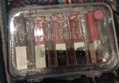 PARIS HILTON 10 PIEZAS COLECCIÓN ACEITE LABIAL CON ESTUCHE SET REGALO ESTUCHE ROTO Foto 1 de 4