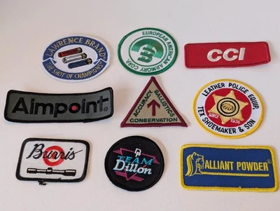 Surtido de armas de fuego de tiro 9 parches sin usar - CCI, Burris, Aimpoint Foto 1 de 4