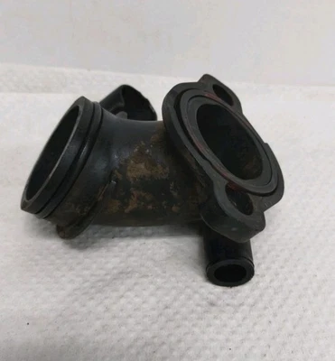 Codo de admisión del motor Briggs & Stratton 697122 OEM motor cortacésped Foto 1 de 4