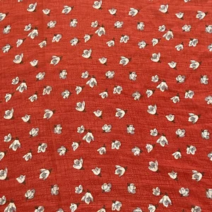 Tela de poliéster de gasa transparente multicolor con estampado floral naranja - por yarda - Imagen 1 de 2