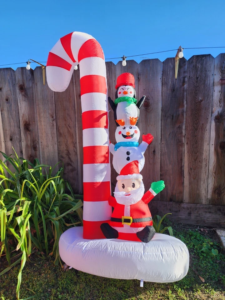 糖果甘蔗,圣诞老人,雪人和企鹅充气塔 — 第 1/1 张图片