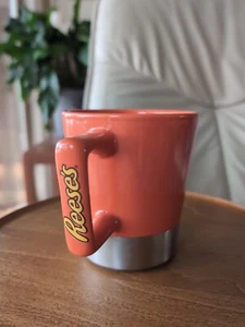 Reese's Peanut Butter Cup 12 oz. Ceramic Coffee Cup Mug with Silver Bottom - Picture 1 of 11