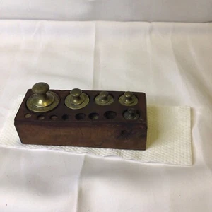 SET OF 5 OLD SOLID BRASS WEIGHTS IN WOOD HOLDER - Picture 1 of 17