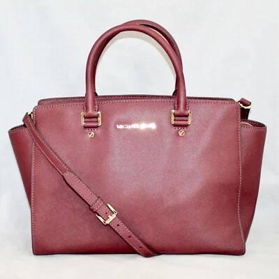 Bolsa satchel Michael Kors Selma conversível tiracolo couro vermelho borgonha - Imagem 1 de 4
