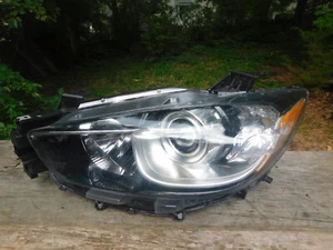 Mazda CX-5 Headlight 216-1166L-LDEMN Tyco Aftermarket - Imagen 1 de 11