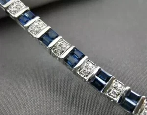 10 Karat Baguetteschliff Laborgefertigtes Saphir Tennisarmband 14 Karat Weißgold vergoldet - Bild 1 von 4