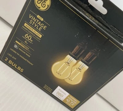 2 Pack GE Vtg Style Amber Glass Warm Candle Light Bulb 60w 560 Lumens/205d - Image 1 of 4