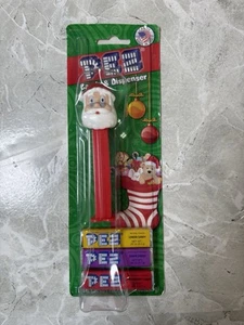 Dispensador de caramelos con patas de Papá Noel PEZ 2014 vasos dulces - Imagen 1 de 4