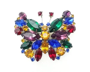 Broche mariposa vintage en tono plateado años 60 - 1970 varios colores diamantes de imitación - Imagen 1 de 5