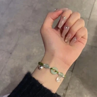 Bracciali dell'amicizia in giada intrecciati a mano con suoni di campana per nar - Immagine 1 di 4