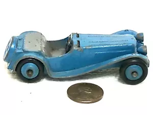 Antiguo coche de juguete miniatura Jaguar azul claro Dinky Toys Inglaterra Metal Meccano Ltd - Imagen 1 de 7
