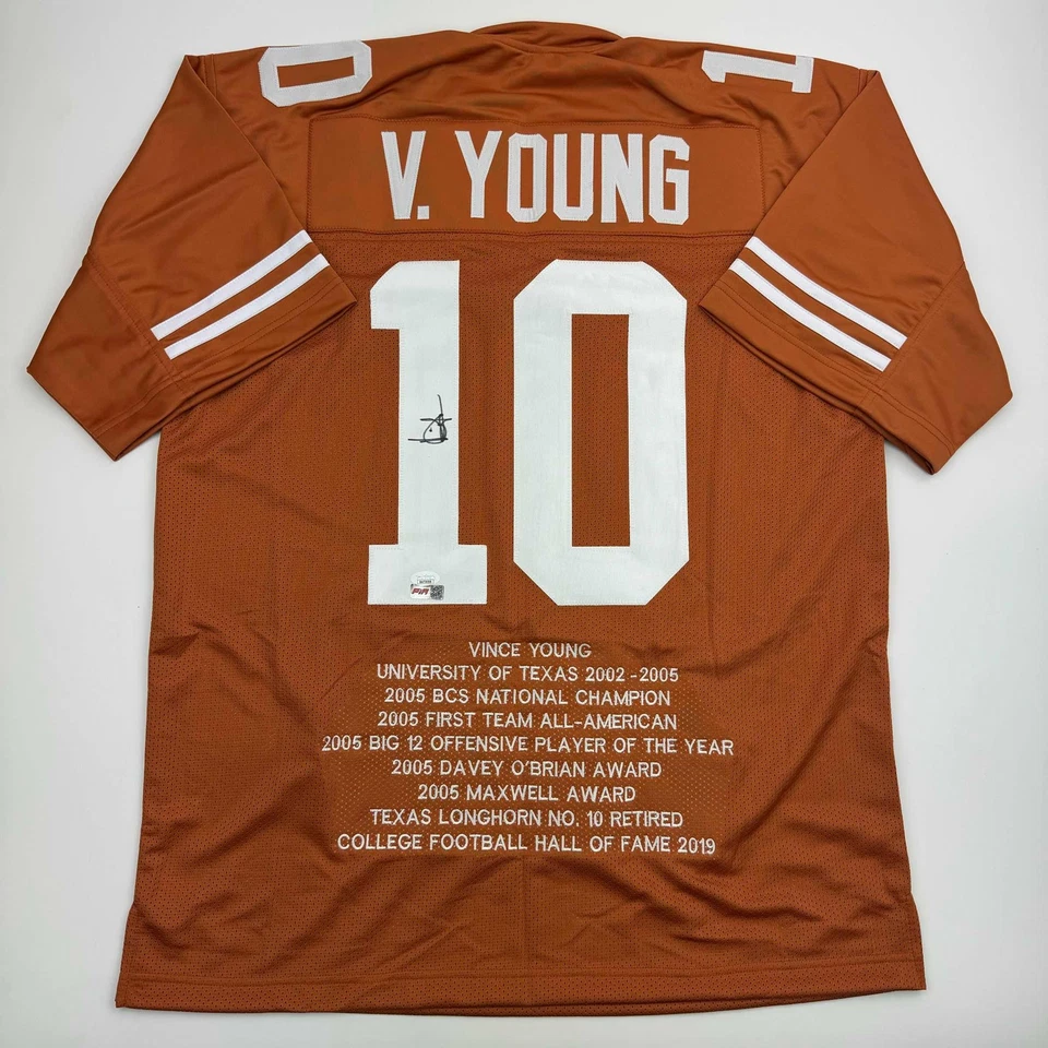 Camiseta de fútbol americano universitario autografiada/firmada Vince Young Texas Orange Stat certificado de autenticidad JSA Foto 1 de 4