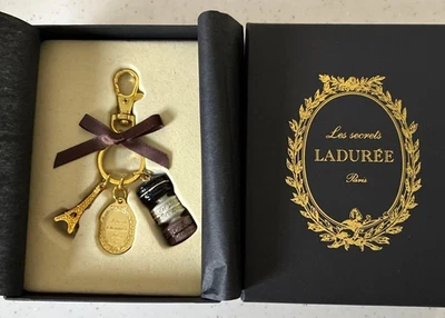 LADUREE Paris Llavero Anillo Macarons Negro Gris Marrón Cinta Torre Eiffel Nuevo Foto 1 de 4