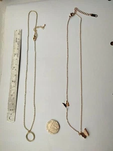 Gold Tone Round necklace And Rose Gold Tone Butterfly Necklace - Picture 1 of 5