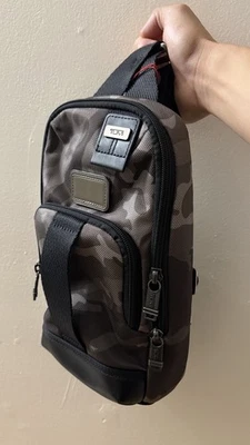 NWT Tumi FIFE Slim Sling Bag Khaki Camouflage - Image 1 of 4