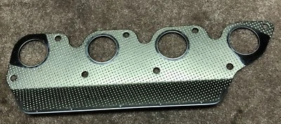 Junta colector escape Chrysler MD025684 original nueva. Foto 1 de 4