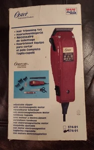 Vintage Oster Electric Clippers with some attatchments Model 374-91 Series - Picture 1 of 4