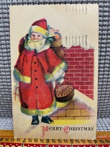 Cartolina antica natalizia mantello Babbo Natale consegna giocattoli con affrancatura firmata 1922 - Foto 1 di 3