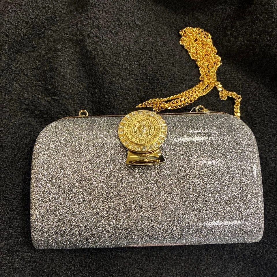 Bolso Clutch Pierre Balmain Cadena Tono Dorado en Plata USADO Buen Estado Foto 1 de 3