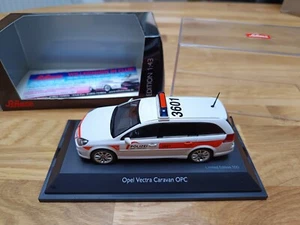 Opel Vectra Caravan OPC Polizei Baselland 1:43 Schuco 04972 - Bild 1 von 9