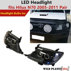 Faros para Toyota Hilux N70 2005-11 proyector negro ojos de ángel DRLPair - Imagen 1 de 9