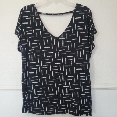 Top elástico con recorte trasero azul marino antiguo para mujer L negro blanco estampado tejido manga corta Foto 1 de 4