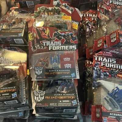 HASBRO TRANSFORMERS GENERATIONS FALL OF CYBERTRON EJECT & RAMHORN SEALED FOC - Image 1 of 3